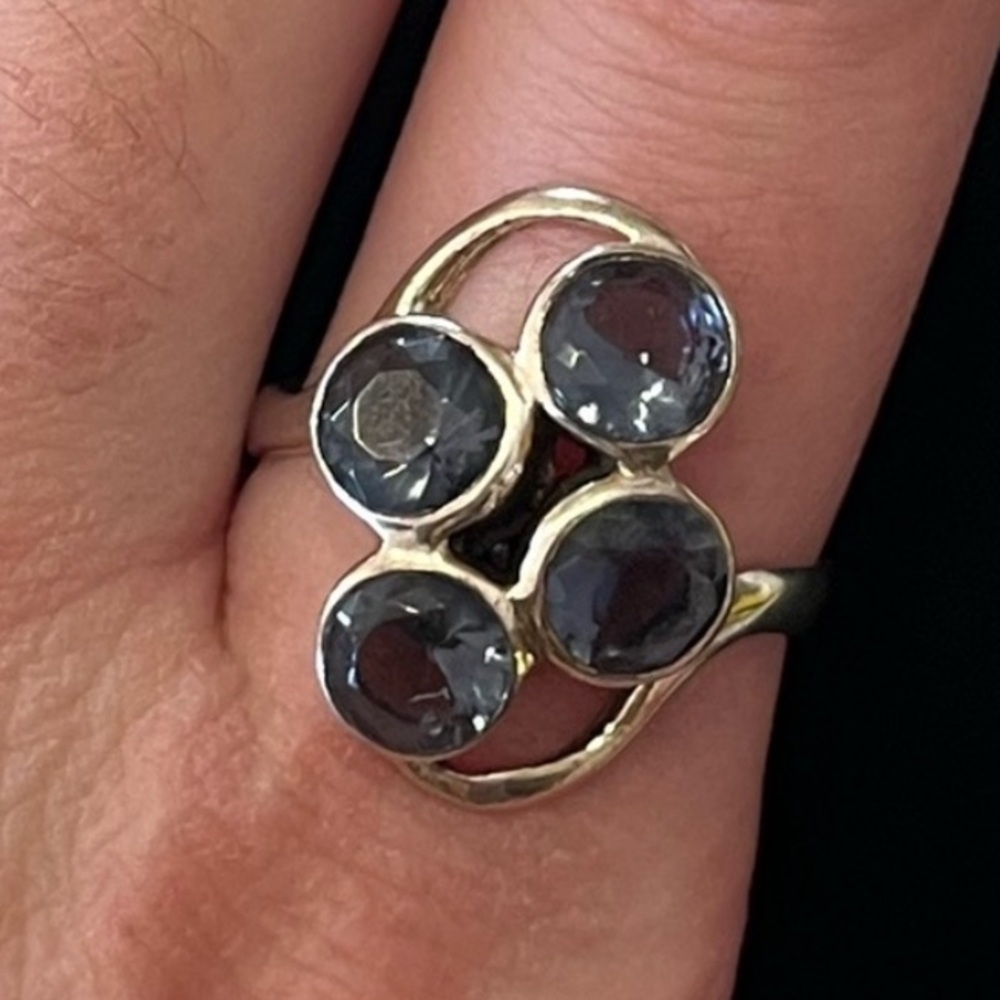 Gorgeous ring with blue stones. Unique design. Bold. Statement. 
Size 8.5